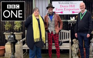 Antiques expert David Harper with Doreshill Farm Emporium owners by Mel Hicks and her husband Rob