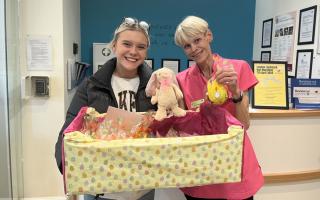 Macie Edkins-Wherry delivering Easter treats to Solent Grange's Ali French