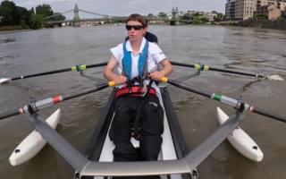 A video still of Becky Coleman rowing on the Thames in preparation for taking on the university Boat Race course next month.