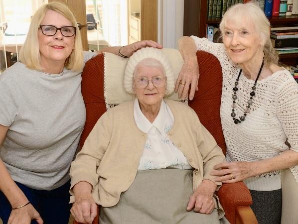 Alice Tomlinson of Freshwater has died at the age of 107. She is pictured here with daughters, left, Linda Burman, and right, Patricia Charman.